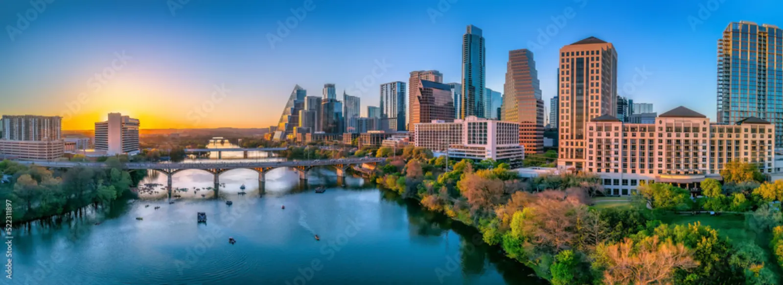 Downtown Austin, Texas skyline along Lady Bird Lake at sunset